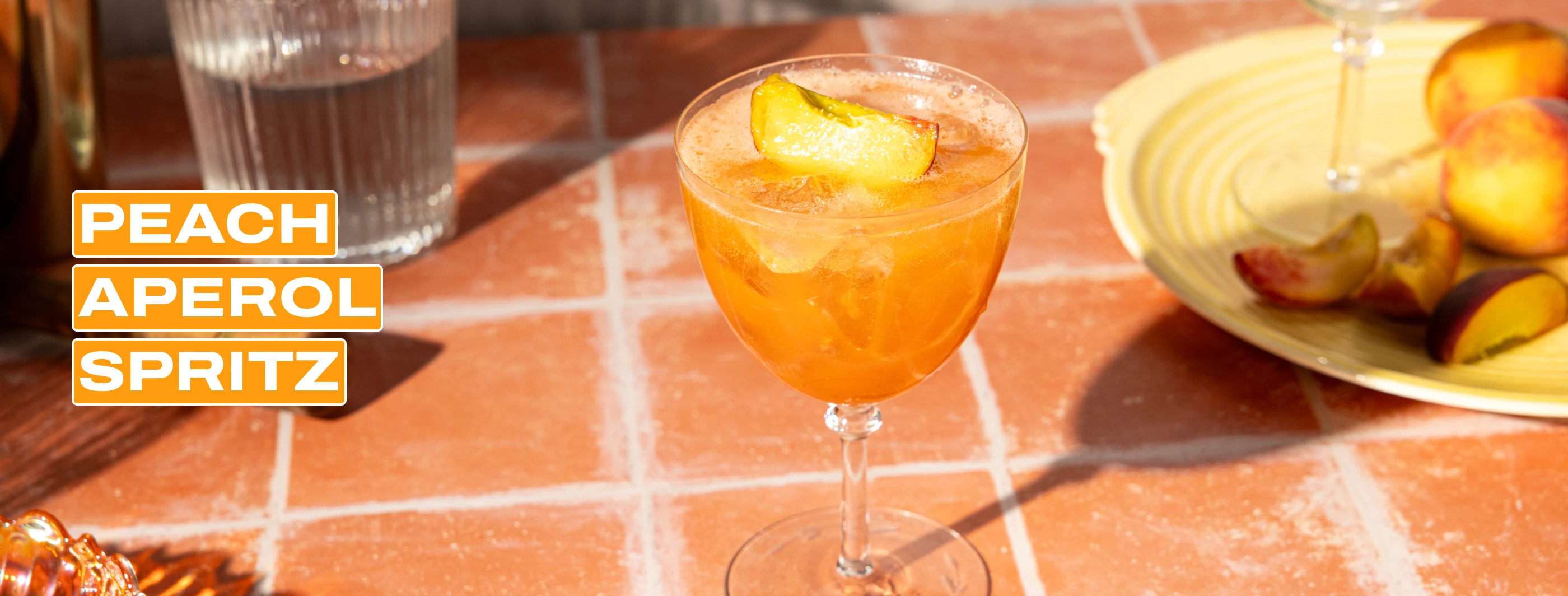 a peach Aperol spritz cocktail