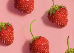 Strawberries on pink background