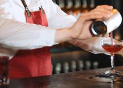 Bartender making Jack Rose Cocktail