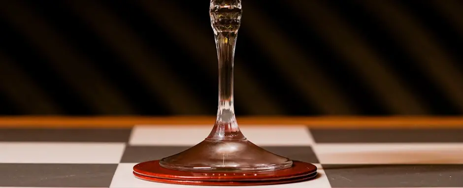 Cocktail on checkered table 