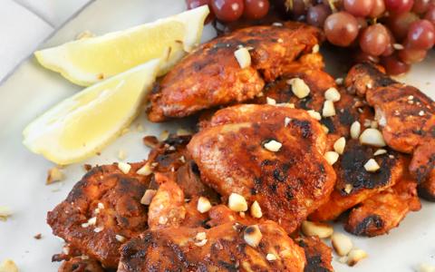 Grilled Chicken Thighs with Rum Grapes and Slivered Almonds