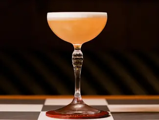 Cocktail on checkered table 