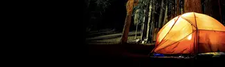 Nighttime photo of orange tent