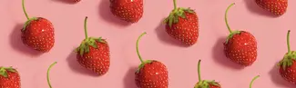 Strawberries on pink background