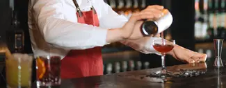 Bartender making Jack Rose Cocktail