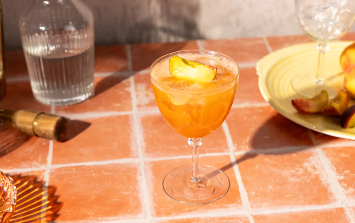 A photograph of the Peach Aperol Spritz Cocktail