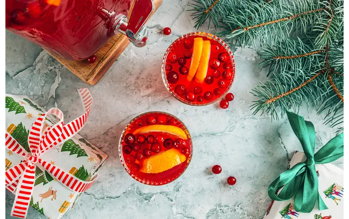 Cranberry pomegranate cosmopolitan cocktail. Recipe by Ethan Guillemette