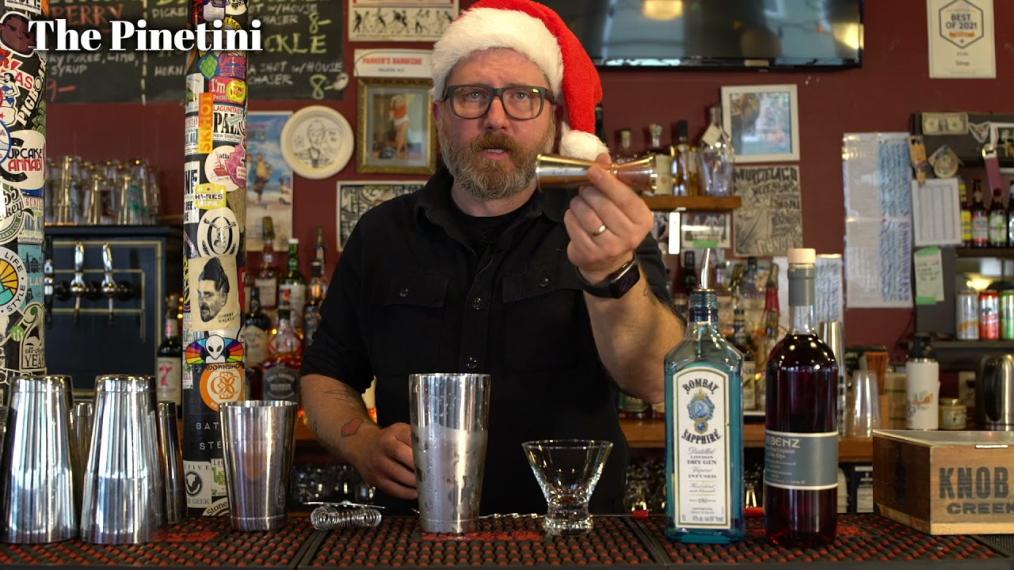 This week on Happy Hour - Holiday Edition - Our friend Spencer is making a martini with gin and a pine liqueur. Together, this "Pinetini" has the perfect festive flavor. Cheers!